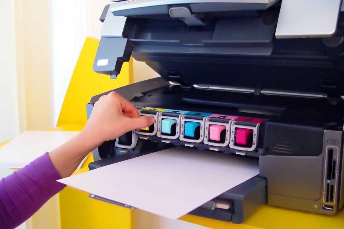 impressora tanque de tinta ou cartucho