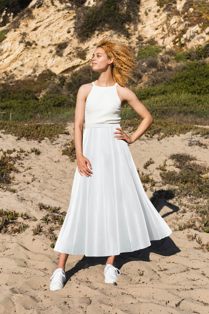 looks com saia midi plissada