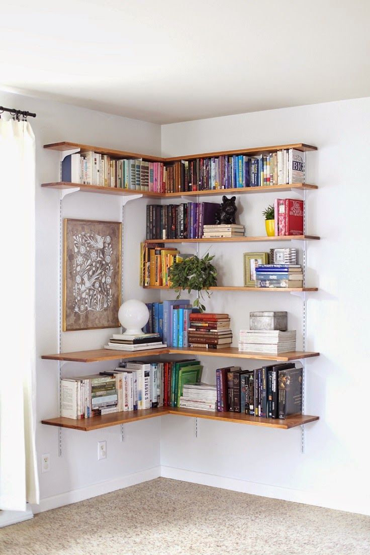 ideias de nichos para livros no quarto pequeno